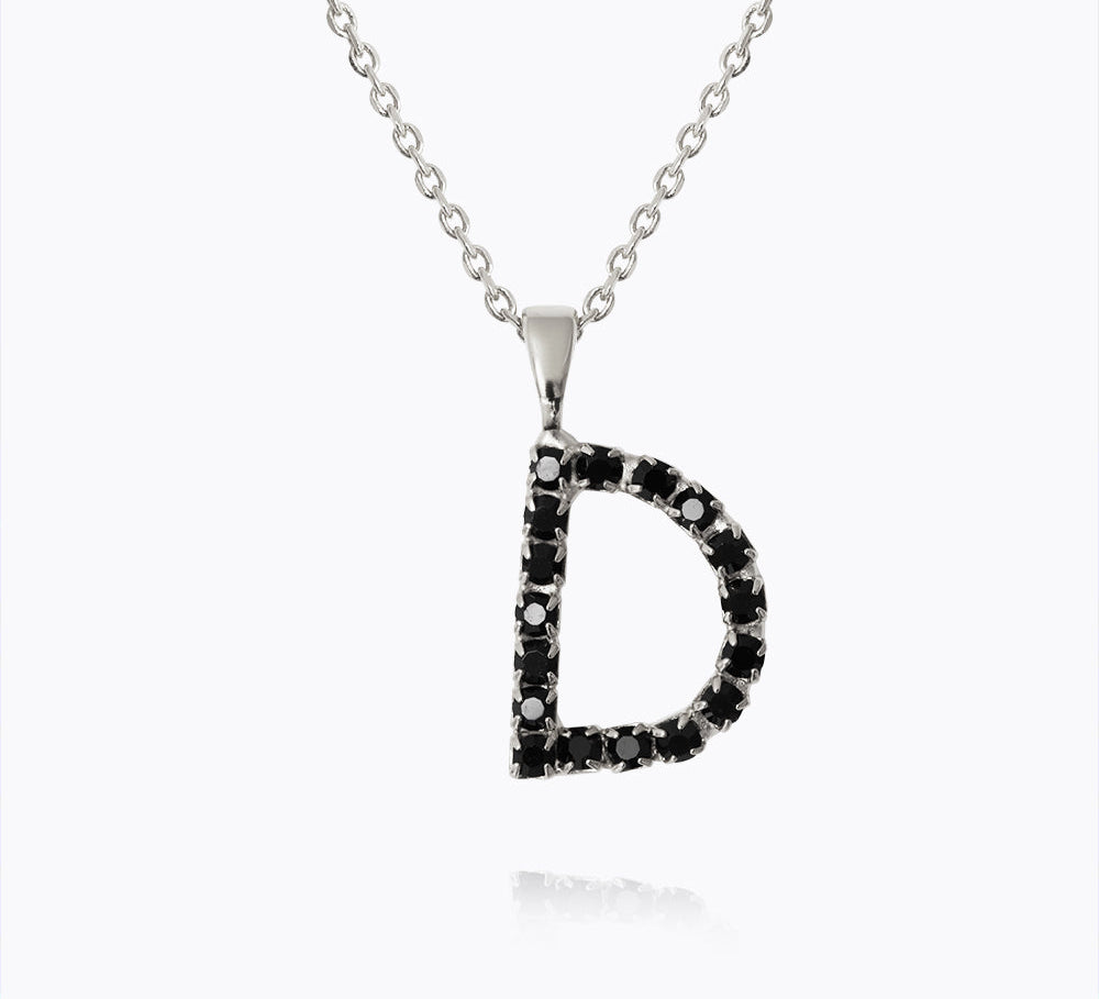Caroline Svedbom - Mini Letter Black Necklace Letter D Rhodium
