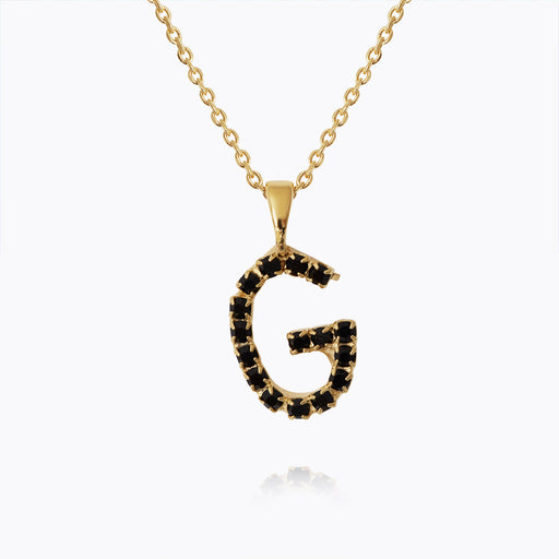 Caroline Svedbom - Mini Letter Black Necklace Letter G Gold