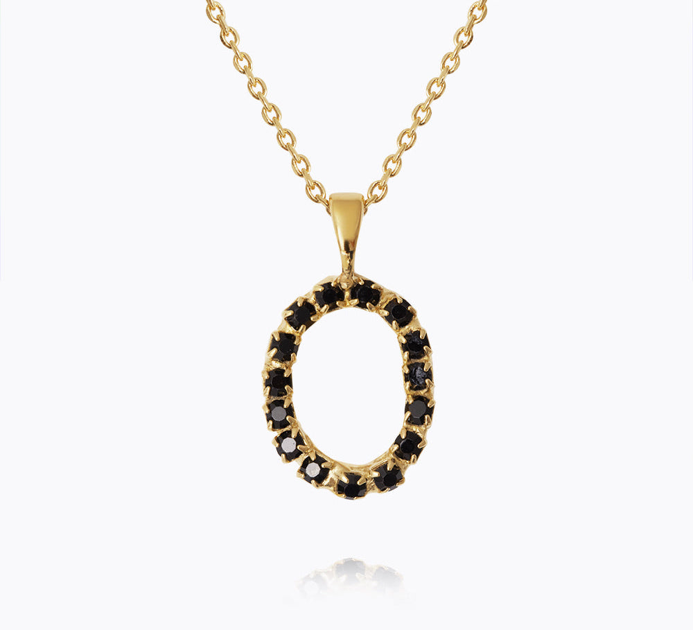 Caroline Svedbom - Mini Letter Black Necklace Letter O Gold
